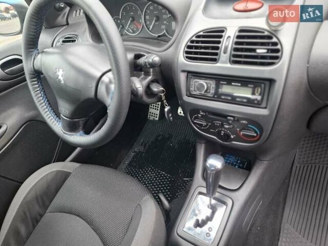 Синий Пежо 206, объемом двигателя 1.36 л и пробегом 153 тыс. км за 4400 $, фото 11 на Automoto.ua