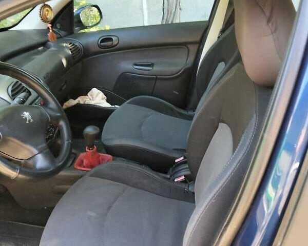 Синій Пежо 206, об'ємом двигуна 1.4 л та пробігом 280 тис. км за 2999 $, фото 26 на Automoto.ua