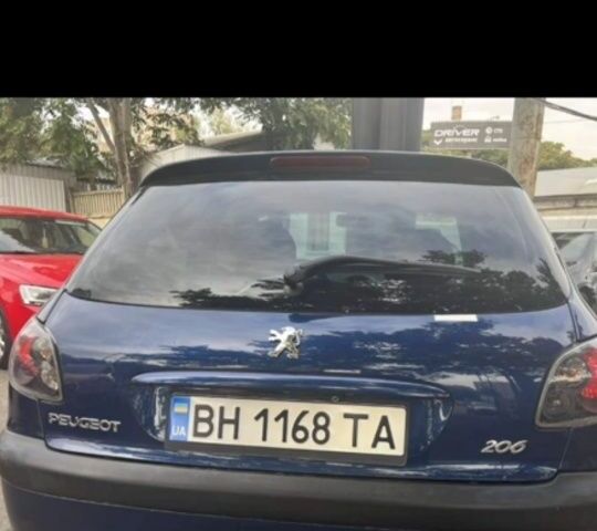 Синий Пежо 206, объемом двигателя 1.4 л и пробегом 183 тыс. км за 3800 $, фото 2 на Automoto.ua