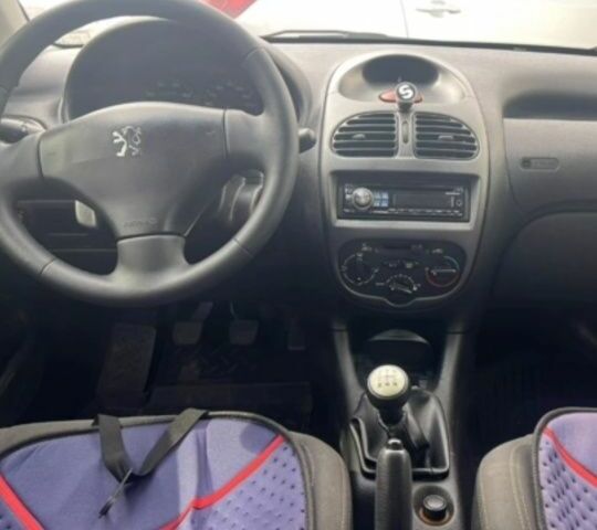 Синий Пежо 206, объемом двигателя 1.4 л и пробегом 183 тыс. км за 3800 $, фото 5 на Automoto.ua