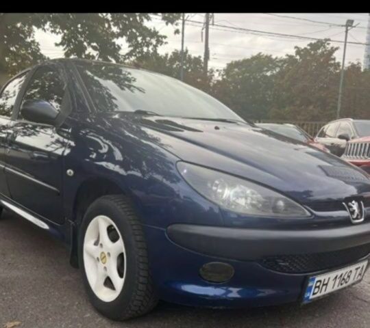 Синий Пежо 206, объемом двигателя 1.4 л и пробегом 183 тыс. км за 3800 $, фото 3 на Automoto.ua