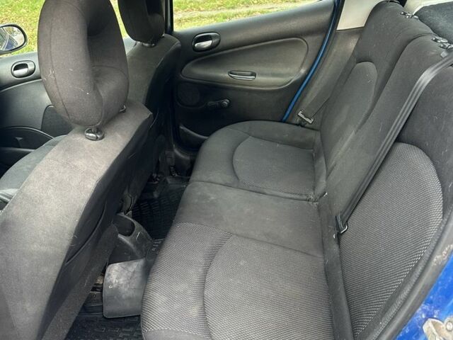 Синий Пежо 206, объемом двигателя 1.4 л и пробегом 193 тыс. км за 3500 $, фото 4 на Automoto.ua