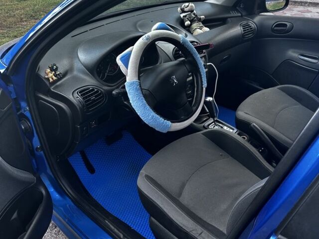 Синий Пежо 206, объемом двигателя 1.4 л и пробегом 151 тыс. км за 6400 $, фото 3 на Automoto.ua