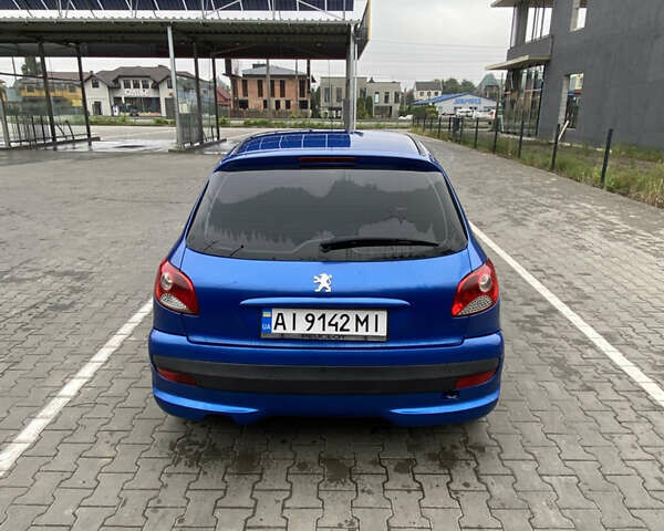Синий Пежо 206, объемом двигателя 1.36 л и пробегом 197 тыс. км за 3800 $, фото 6 на Automoto.ua