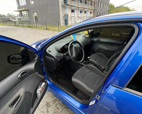 Синий Пежо 206, объемом двигателя 1.36 л и пробегом 197 тыс. км за 3800 $, фото 9 на Automoto.ua