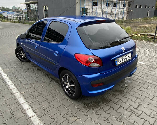 Синий Пежо 206, объемом двигателя 1.36 л и пробегом 197 тыс. км за 3800 $, фото 5 на Automoto.ua