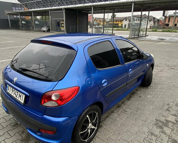 Синий Пежо 206, объемом двигателя 1.36 л и пробегом 197 тыс. км за 3800 $, фото 7 на Automoto.ua
