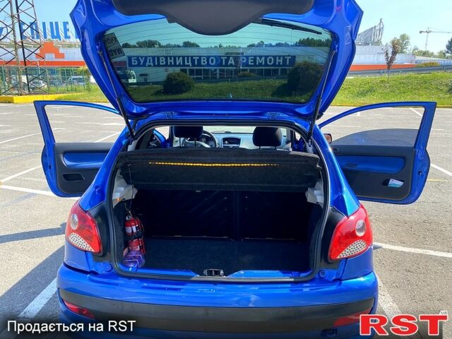 Синий Пежо 206, объемом двигателя 1.1 л и пробегом 165 тыс. км за 4300 $, фото 5 на Automoto.ua