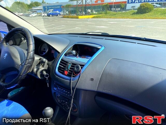 Синий Пежо 206, объемом двигателя 1.1 л и пробегом 165 тыс. км за 4300 $, фото 8 на Automoto.ua