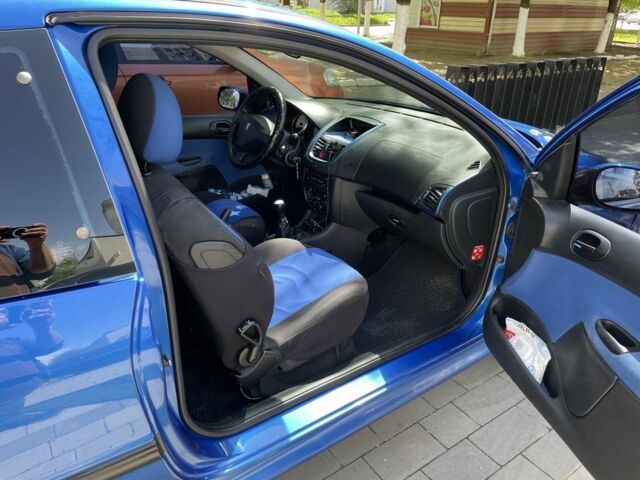 Синий Пежо 206, объемом двигателя 1.1 л и пробегом 159 тыс. км за 4400 $, фото 15 на Automoto.ua