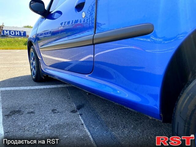 Синий Пежо 206, объемом двигателя 1.1 л и пробегом 165 тыс. км за 4300 $, фото 12 на Automoto.ua