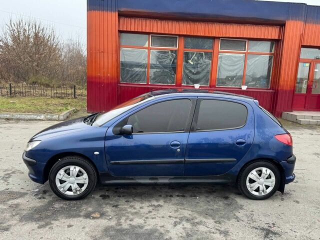 Синий Пежо 206, объемом двигателя 1.1 л и пробегом 2 тыс. км за 3500 $, фото 5 на Automoto.ua