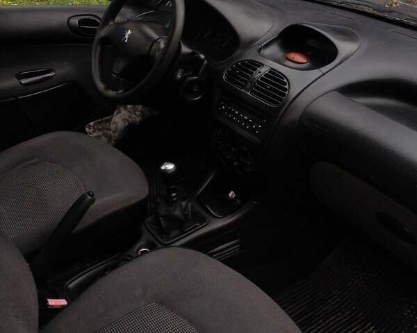 Синий Пежо 206, объемом двигателя 1.36 л и пробегом 184 тыс. км за 3000 $, фото 10 на Automoto.ua