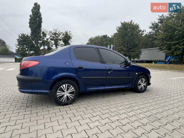 Синий Пежо 206, объемом двигателя 1.36 л и пробегом 253 тыс. км за 2100 $, фото 1 на Automoto.ua