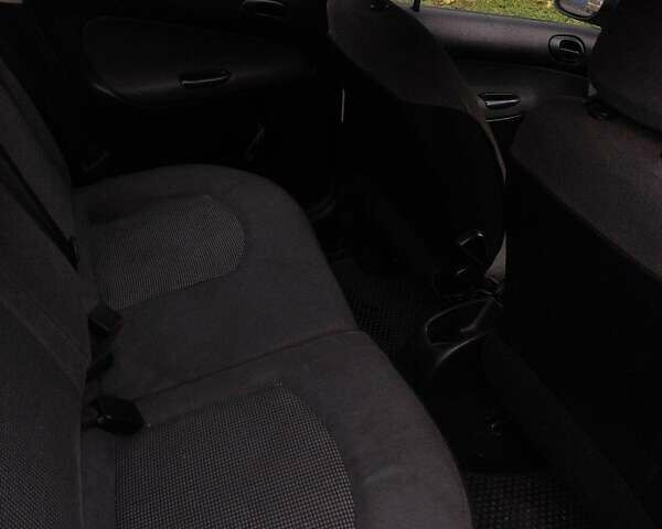 Синий Пежо 206, объемом двигателя 1.36 л и пробегом 184 тыс. км за 3000 $, фото 9 на Automoto.ua