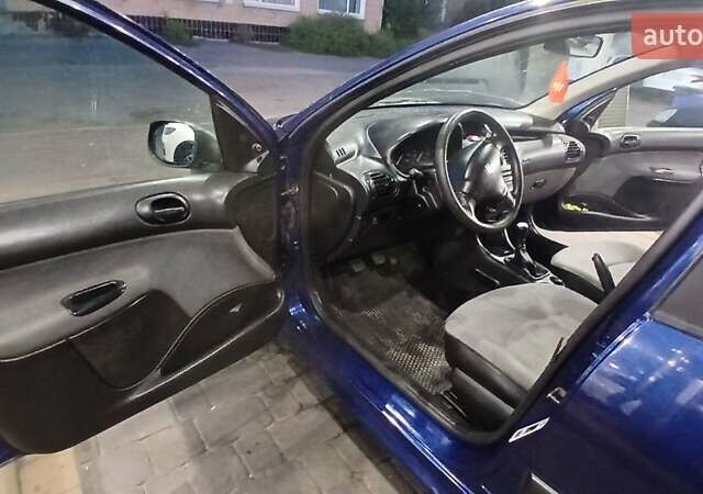 Синий Пежо 206, объемом двигателя 1.4 л и пробегом 184 тыс. км за 3000 $, фото 16 на Automoto.ua