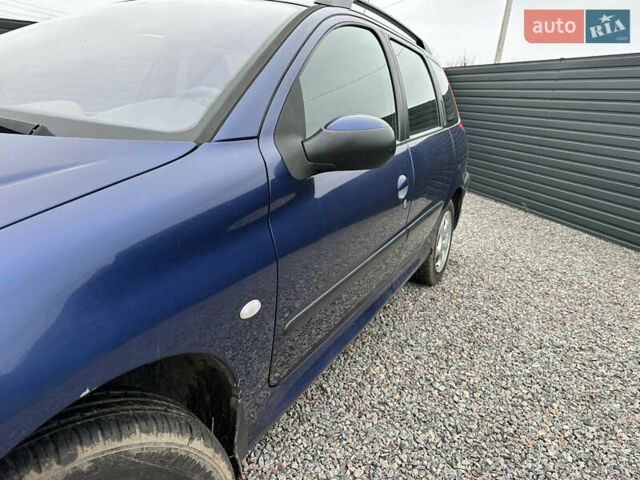 Синий Пежо 206, объемом двигателя 1.36 л и пробегом 217 тыс. км за 3150 $, фото 6 на Automoto.ua