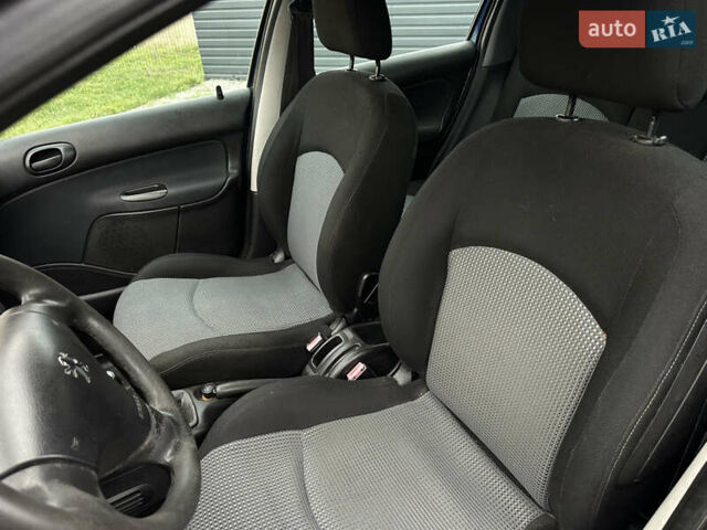 Синий Пежо 206, объемом двигателя 1.36 л и пробегом 217 тыс. км за 3150 $, фото 17 на Automoto.ua