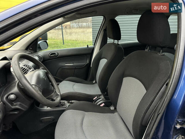 Синий Пежо 206, объемом двигателя 1.36 л и пробегом 217 тыс. км за 3150 $, фото 19 на Automoto.ua