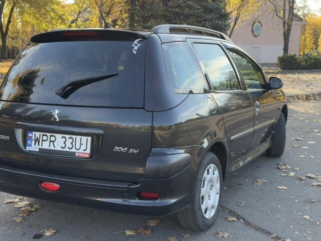 Синий Пежо 206, объемом двигателя 1.4 л и пробегом 230 тыс. км за 2450 $, фото 3 на Automoto.ua