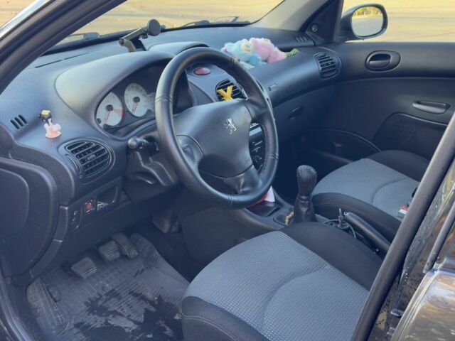 Синий Пежо 206, объемом двигателя 1.4 л и пробегом 230 тыс. км за 2450 $, фото 4 на Automoto.ua