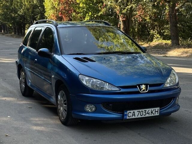 Синий Пежо 206, объемом двигателя 1.6 л и пробегом 225 тыс. км за 3800 $, фото 12 на Automoto.ua