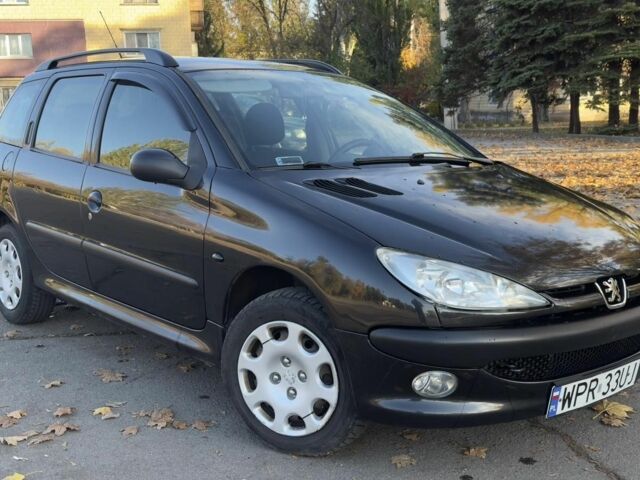 Синий Пежо 206, объемом двигателя 1.4 л и пробегом 230 тыс. км за 2450 $, фото 2 на Automoto.ua