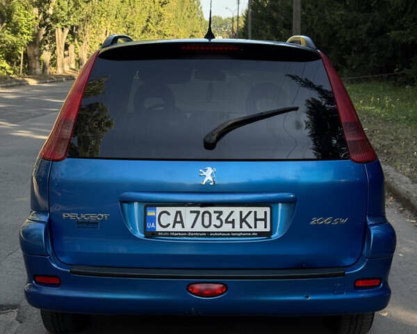Синий Пежо 206, объемом двигателя 1.59 л и пробегом 200 тыс. км за 3700 $, фото 3 на Automoto.ua