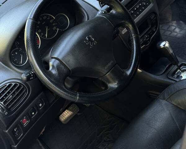 Синий Пежо 206, объемом двигателя 1.59 л и пробегом 200 тыс. км за 3700 $, фото 8 на Automoto.ua
