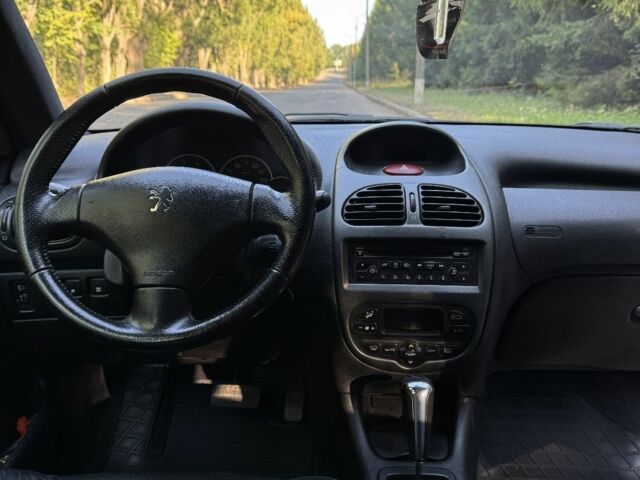 Синий Пежо 206, объемом двигателя 1.6 л и пробегом 225 тыс. км за 3800 $, фото 3 на Automoto.ua