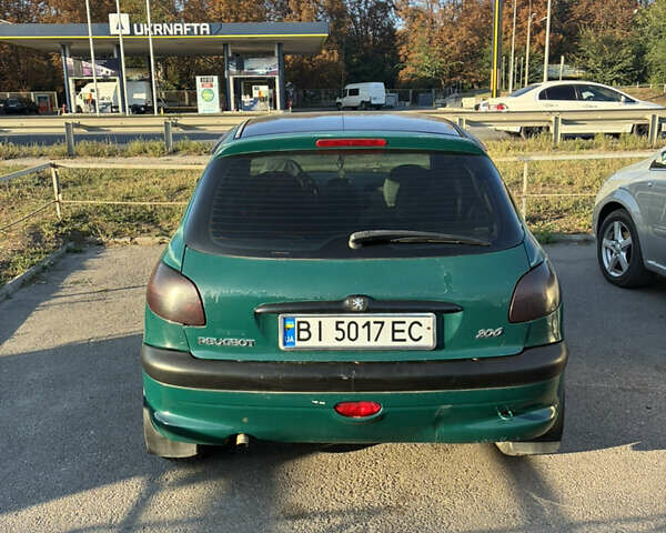 Зеленый Пежо 206, объемом двигателя 1.1 л и пробегом 323 тыс. км за 2000 $, фото 4 на Automoto.ua
