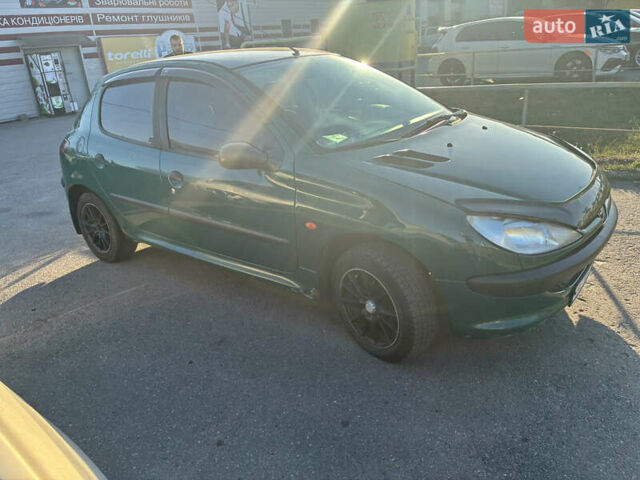 Зеленый Пежо 206, объемом двигателя 1.1 л и пробегом 323 тыс. км за 2000 $, фото 2 на Automoto.ua