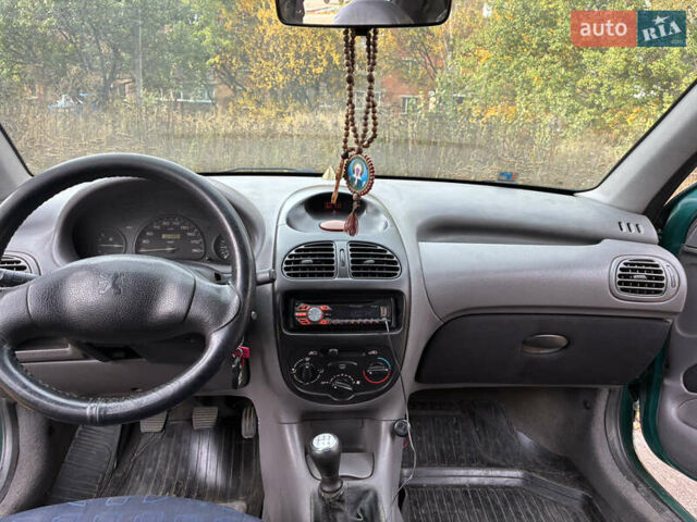 Зеленый Пежо 206, объемом двигателя 1.1 л и пробегом 323 тыс. км за 2000 $, фото 5 на Automoto.ua