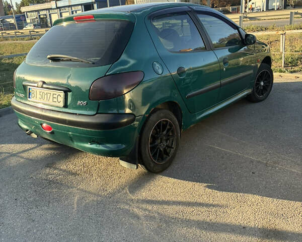 Зеленый Пежо 206, объемом двигателя 1.1 л и пробегом 323 тыс. км за 2000 $, фото 1 на Automoto.ua