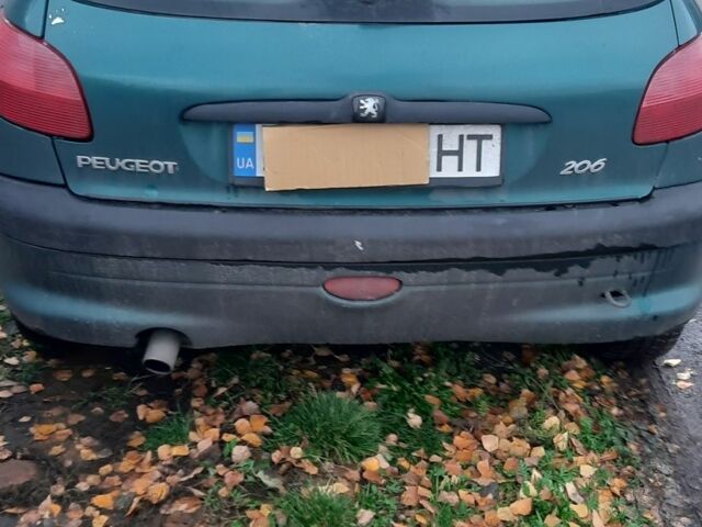 Зеленый Пежо 206, объемом двигателя 1.8 л и пробегом 250 тыс. км за 1100 $, фото 3 на Automoto.ua