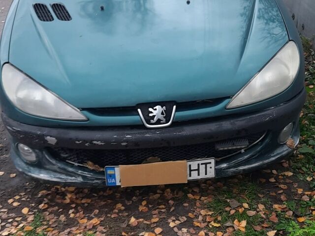 Зеленый Пежо 206, объемом двигателя 1.8 л и пробегом 250 тыс. км за 1100 $, фото 2 на Automoto.ua