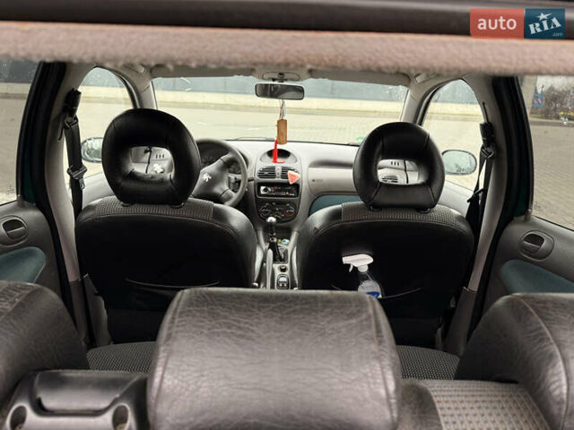 Зелений Пежо 206, об'ємом двигуна 1.4 л та пробігом 239 тис. км за 2300 $, фото 11 на Automoto.ua