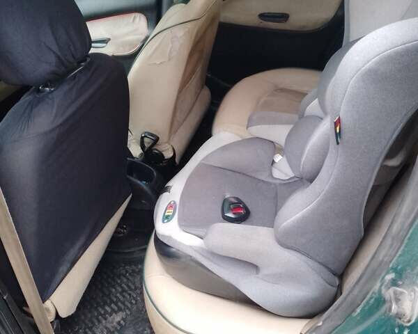 Зеленый Пежо 206, объемом двигателя 1.59 л и пробегом 237 тыс. км за 2300 $, фото 1 на Automoto.ua