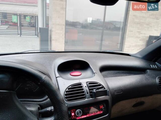 Зеленый Пежо 206, объемом двигателя 1.59 л и пробегом 237 тыс. км за 2300 $, фото 10 на Automoto.ua