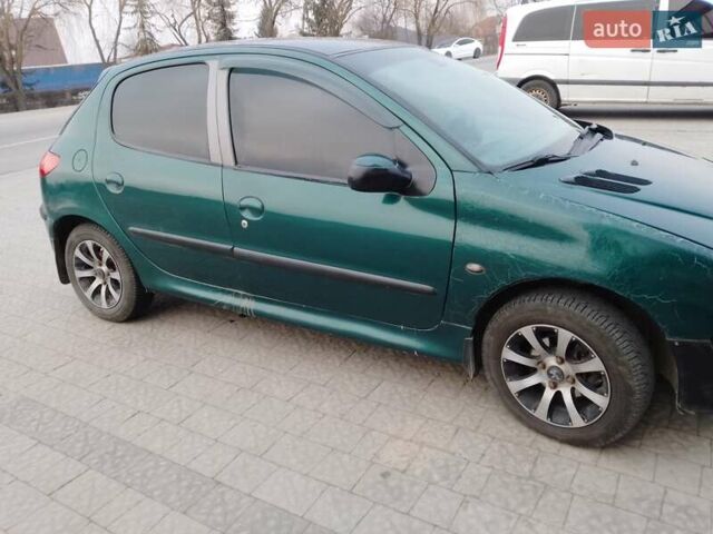 Зеленый Пежо 206, объемом двигателя 1.59 л и пробегом 237 тыс. км за 2300 $, фото 8 на Automoto.ua