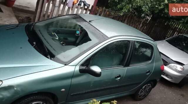 Зелений Пежо 206, об'ємом двигуна 1.36 л та пробігом 370 тис. км за 3000 $, фото 5 на Automoto.ua