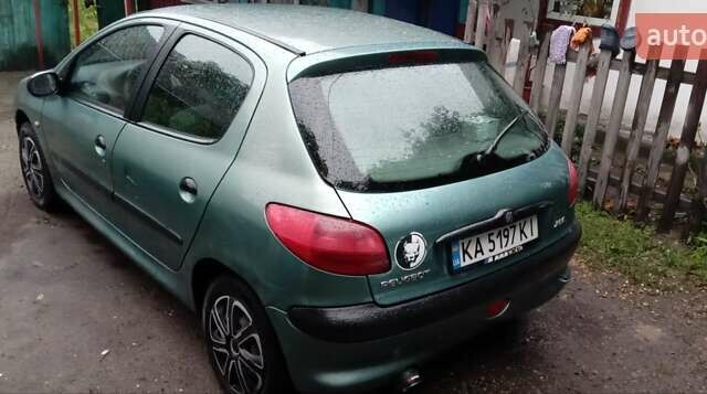 Зелений Пежо 206, об'ємом двигуна 1.36 л та пробігом 370 тис. км за 3000 $, фото 10 на Automoto.ua
