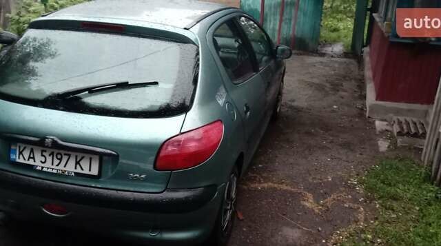 Зелений Пежо 206, об'ємом двигуна 1.36 л та пробігом 370 тис. км за 3000 $, фото 11 на Automoto.ua