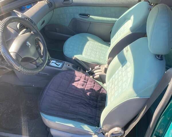 Зелений Пежо 206, об'ємом двигуна 1.36 л та пробігом 220 тис. км за 2900 $, фото 26 на Automoto.ua