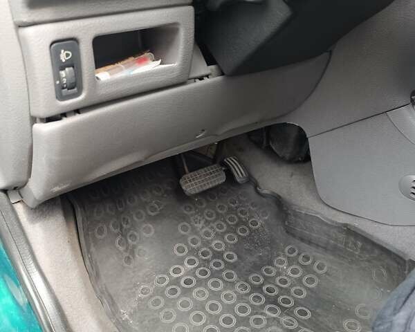 Зелений Пежо 206, об'ємом двигуна 1.36 л та пробігом 220 тис. км за 2900 $, фото 33 на Automoto.ua