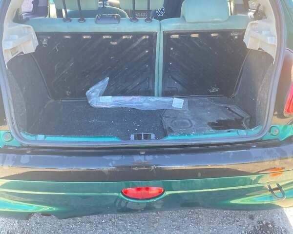 Зелений Пежо 206, об'ємом двигуна 1.36 л та пробігом 220 тис. км за 2900 $, фото 22 на Automoto.ua