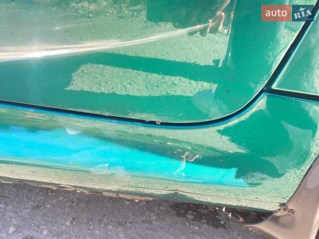 Зелений Пежо 206, об'ємом двигуна 1.36 л та пробігом 220 тис. км за 2900 $, фото 34 на Automoto.ua