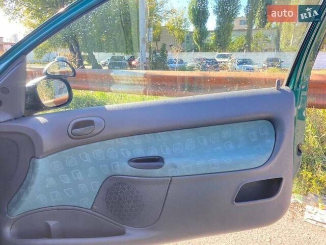Зелений Пежо 206, об'ємом двигуна 1.36 л та пробігом 220 тис. км за 2900 $, фото 27 на Automoto.ua