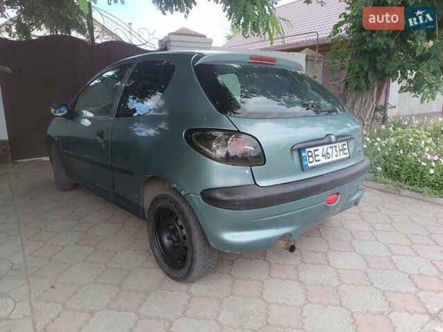 Зеленый Пежо 206, объемом двигателя 1.12 л и пробегом 280 тыс. км за 2800 $, фото 5 на Automoto.ua