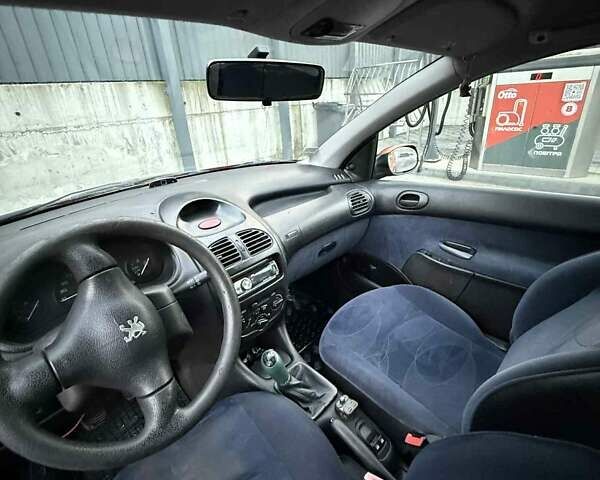 Оранжевый Пежо 206, объемом двигателя 1.12 л и пробегом 272 тыс. км за 1700 $, фото 8 на Automoto.ua